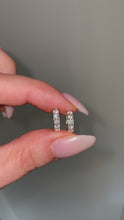 Load and play video in Gallery viewer, MEDORA - Grand Pavé Hoop Huggie Earrings
