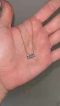Load and play video in Gallery viewer, JACQUELINE - Two-Stone Pear and Round Diamond Necklace II
